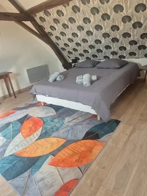 Un ou plusieurs lits dans un hébergement de l'établissement Maison campagnarde