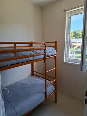 Un ou plusieurs lits dans un hébergement de l'établissement Cottage Rubens 11 2chambres calme