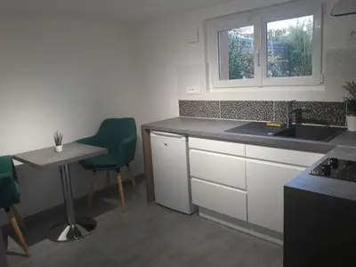 Cuisine ou kitchenette dans l'établissement Au coeur des Châteaux - Wifi - Jardin
