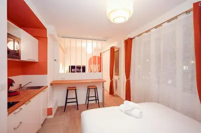 Un ou plusieurs lits dans un hébergement de l'établissement Suite romantique avec Spa