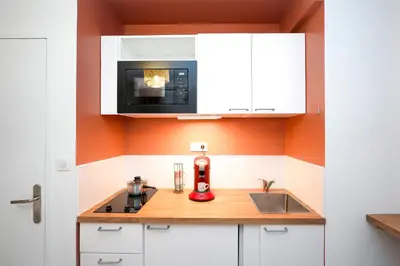 Cuisine ou kitchenette dans l'établissement Suite romantique avec Spa