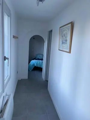 Un ou plusieurs lits dans un hébergement de l'établissement Maison en RDC an Campagne bucolique