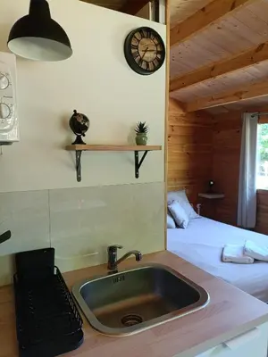 Un ou plusieurs lits dans un hébergement de l'établissement Camping Les Rochelles