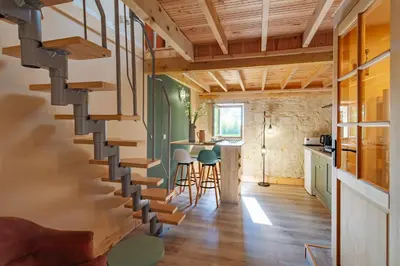 Cuisine ou kitchenette dans l'établissement Gite de la Ferme du Château 2 - Studio Climatisé