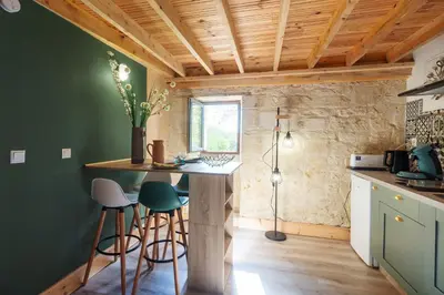 Cuisine ou kitchenette dans l'établissement Gite de la Ferme du Château 2 - Studio Climatisé