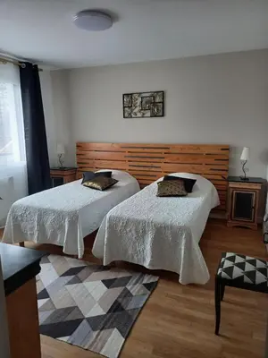 Un ou plusieurs lits dans un hébergement de l'établissement Maison au bord de l'eau