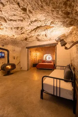 Un ou plusieurs lits dans un hébergement de l'établissement Le Cavernacle