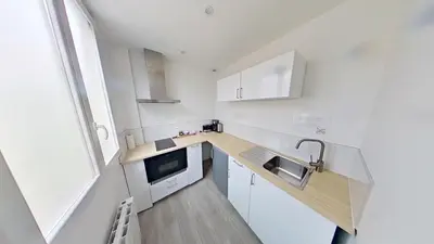 Cuisine ou kitchenette dans l'établissement Amansis grand t2 jardin proche gare