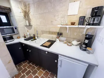 Cuisine ou kitchenette dans l'établissement Le Logis de cœur