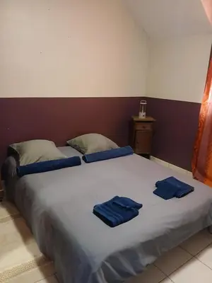Un ou plusieurs lits dans un hébergement de l'établissement Appartement Cosy