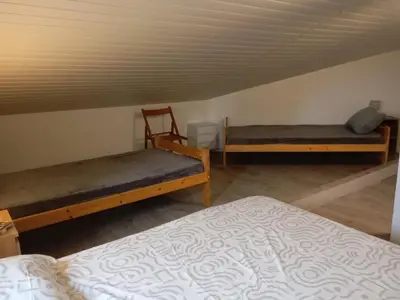 Un ou plusieurs lits dans un hébergement de l'établissement Gîte troglodytique typique et cosy pour escapade paisible - FR-1-410-484