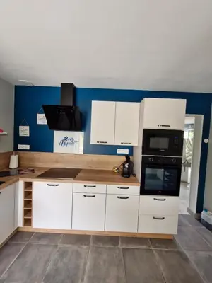 Cuisine ou kitchenette dans l'établissement Cosy la Riveraine Cottage