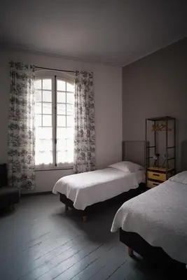 Un ou plusieurs lits dans un hébergement de l'établissement La Maison Saint Aignan