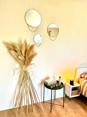 Un ou plusieurs lits dans un hébergement de l'établissement Cocooning appartement