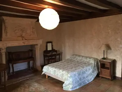 Un ou plusieurs lits dans un hébergement de l'établissement Chateau de Lassay - Charming castle for rent in Sarthe