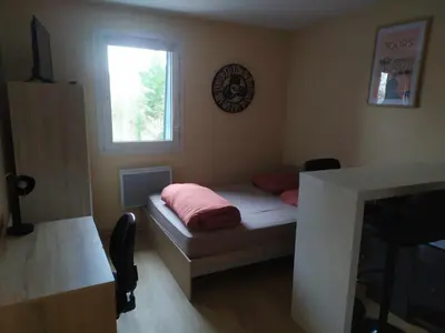 Un ou plusieurs lits dans un hébergement de l'établissement T1 cosy 2 personnes à Tours Sud