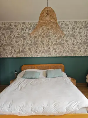 Un ou plusieurs lits dans un hébergement de l'établissement Grande chambre cosy très proche centre ville