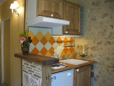 Cuisine ou kitchenette dans l'établissement Chez laurette