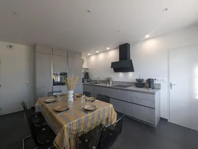 Cuisine ou kitchenette dans l'établissement La Maison des Vergers