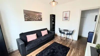 Coin salon dans l'établissement Cozy apartment, close to Gare du Mans