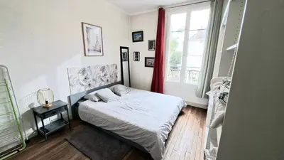 Un ou plusieurs lits dans un hébergement de l'établissement Cozy apartment, close to Gare du Mans