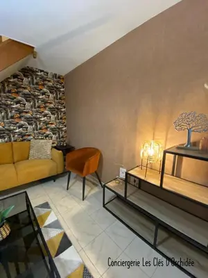 Coin salon dans l'établissement L'Instant Loire