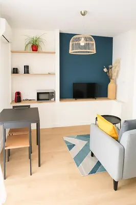 Coin salon dans l'établissement Grand Studio entier proche de Tours