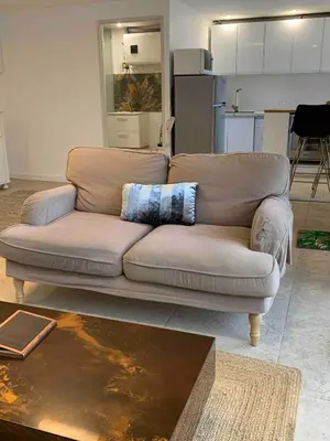 Coin salon dans l'établissement Grand studio cosy avec terrasse