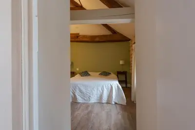 Un ou plusieurs lits dans un hébergement de l'établissement Le Moulin de Touvois 15p Bourgueil piscine