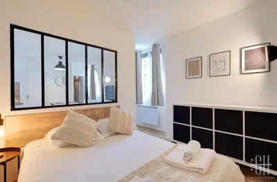 Un ou plusieurs lits dans un hébergement de l'établissement Appartement -Quartier Historique - Hyper Centre
