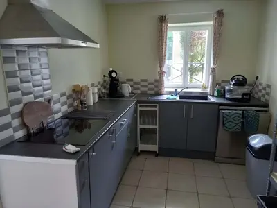 Cuisine ou kitchenette dans l'établissement Gite L'Atout de France