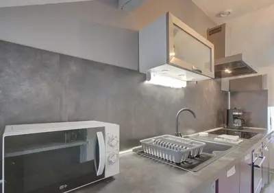 Cuisine ou kitchenette dans l'établissement Cozy T2 - Quartier de Nantilly - Saumur