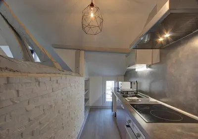 Cuisine ou kitchenette dans l'établissement Cozy T2 - Quartier de Nantilly - Saumur