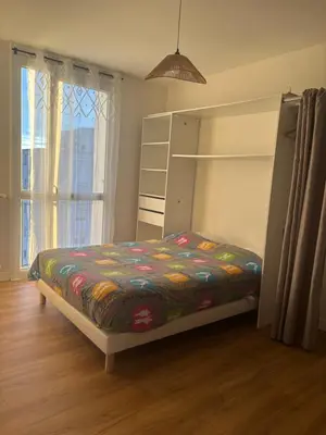 Un ou plusieurs lits dans un hébergement de l'établissement Spacieux T4 lumineux avec balcon confort, calme et modernité à Joué-lès-Tours