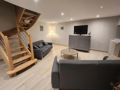 Télévision ou salle de divertissement dans l'établissement Maison de campagne