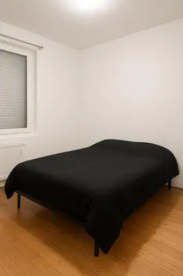Un ou plusieurs lits dans un hébergement de l'établissement Maison 2 chambres proche circuit 24h et toutes commodités