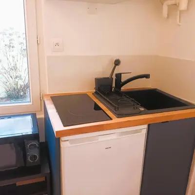 Cuisine ou kitchenette dans l'établissement Le Cosy Colbert - T2 - Cathédrale - Wifi - TV