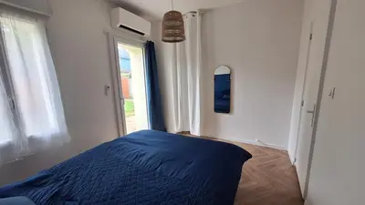Un ou plusieurs lits dans un hébergement de l'établissement La Maison Des Pins
