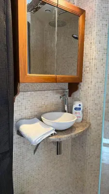 Salle de bains dans l'établissement L'Atelier Paget 2 pers Face Château place de Parking