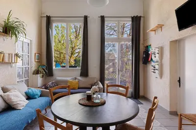 Télévision ou salle de divertissement dans l'établissement Gîte La Marelle