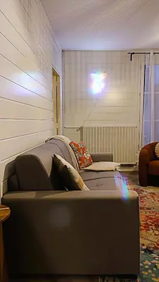 Coin salon dans l'établissement Le 10 du NC - Appartement cosy