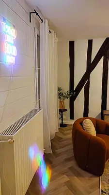 Coin salon dans l'établissement Le 10 du NC - Appartement cosy