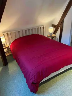 Un ou plusieurs lits dans un hébergement de l'établissement Le Terrier family gîte, 12 people