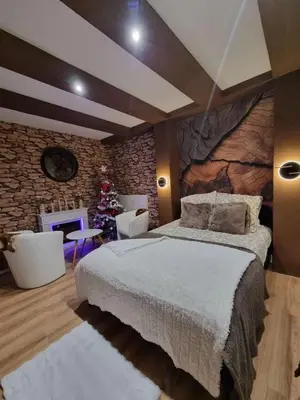 Un ou plusieurs lits dans un hébergement de l'établissement Esprit Chalet en centre ville Confort et charme
