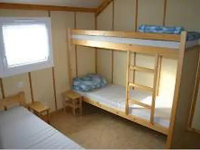 Un ou plusieurs lits dans un hébergement de l'établissement Chalet avec terrasse - 7 pers. - API-1-52-958