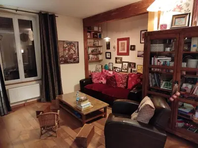 Coin salon dans l'établissement Grande chambre cosy avec salle de bain proche centre ville Le Mans