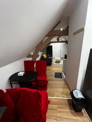 Coin salon dans l'établissement Cozy loft between zoo and castles