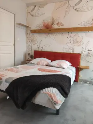 Un ou plusieurs lits dans un hébergement de l'établissement chambre agréable