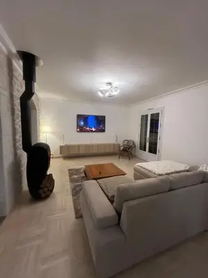 Télévision ou salle de divertissement dans l'établissement Maison chaleureuse Amboise