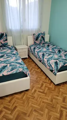 Un ou plusieurs lits dans un hébergement de l'établissement Agreable appartement